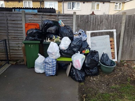 Waste collection truck in Croydon neighborhood