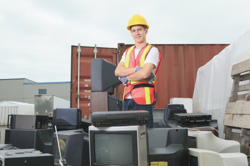 Recycling and sustainability signage in a business rubbish area